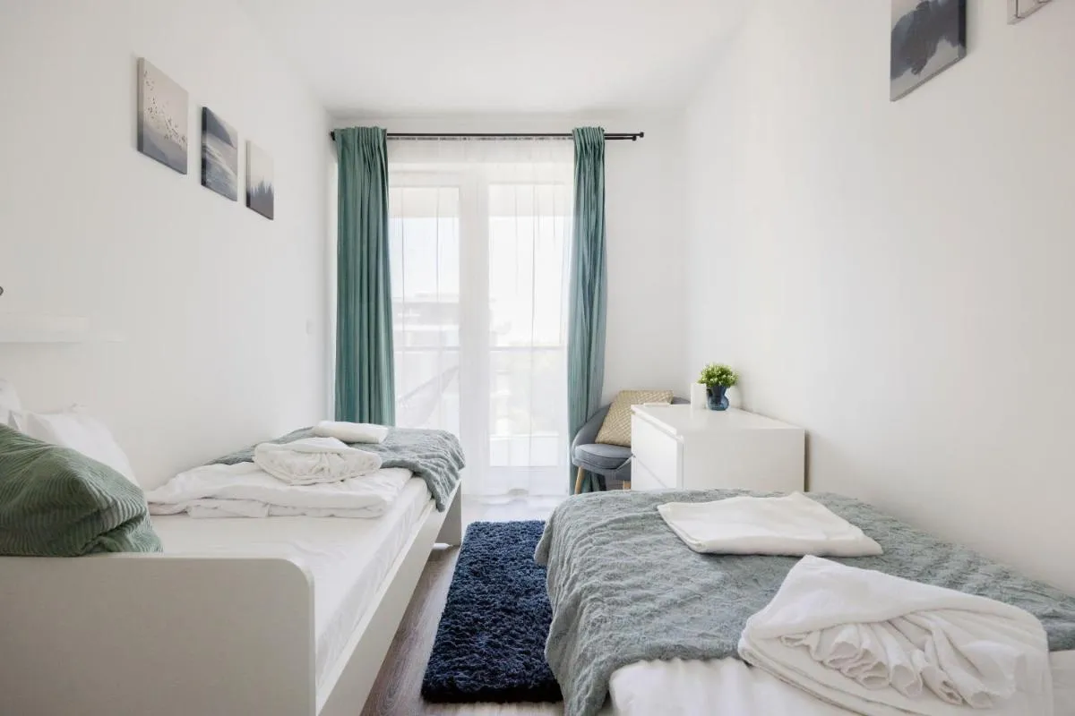 Image 2 of Modern Riverfront Apartment with Free Parking