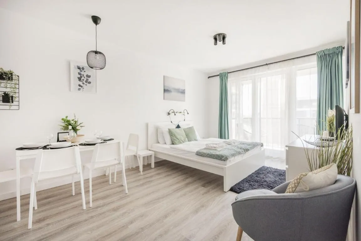 Image of Modern Riverfront Apartment with Free Parking