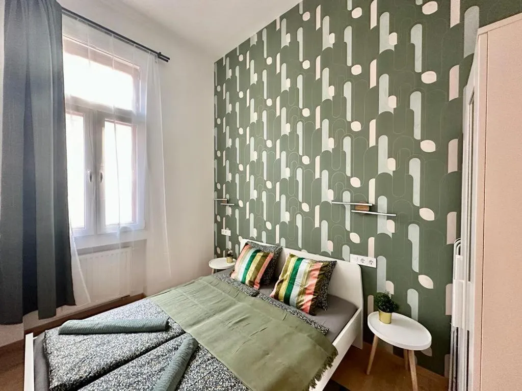 Image of Shiny 3 Bedroom Apartment by GOZSDU Courtyard #downtown #freeparking