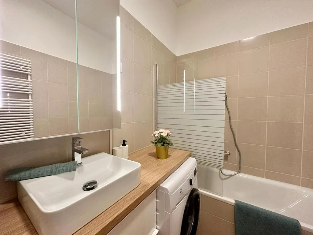 Image 1 of Shiny 3 Bedroom Apartment by GOZSDU Courtyard #downtown #freeparking